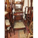 Set of six (four plus two) 20th Century mahogany rail back dining chairs having drop-in seats and