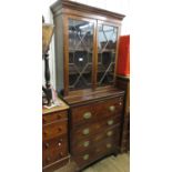 19th Century mahogany and line inlaid secretaire bookcase, the moulded cornice above a pair of