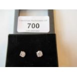 Pair of 18ct white gold round brilliant cut diamond ear studs, approximately 1.02ct total, with