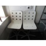 Pair of contemporary white painted laminate and metal swivel chairs