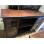 Mahogany bookcase with blind fret over two glass doors and open shelves on block feet