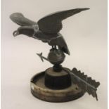 Elm, brass and iron weather vane in the form of an eagle with outstretched wings above an arrow