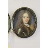 Early 18th Century English school, watercolour portrait miniature of a young James III wearing