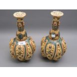 Pair of Zsolnay reticulated baluster form vases, 11.5ins high (with restorations)