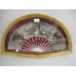 19th Century fan painted with figures in a landscape, housed in a gilt fan shaped frame Condition