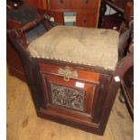 Late 19th / early 20th Century walnut boxseat piano stool, the carved panelled fall front