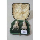 Cased pair of Chester silver condiments