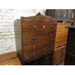 Regency mahogany black line inlaid bow fronted chest of four long drawers with oval brass handles,