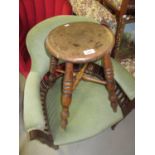 19th Century circular elm stool on bobbin turned supports with crossover stretcher