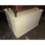 Large white painted pine trunk with hinged cover and iron end handles, 39ins wide