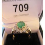 9ct Yellow gold oval emerald and diamond cluster ring