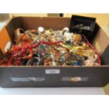 Box containing a large collection of various costume jewellery including necklaces, bracelets,