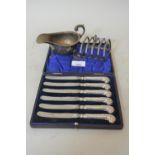 Birmingham silver sauce boat, Birmingham silver four division toast rack and a cased set of silver