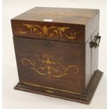 19th Century rosewood floral and urn inlaid decanter / games box having hinged cover, with