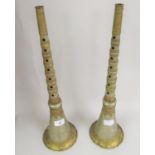 Pair of Tibetan wooden metal covered horns with gilded decorative mounts and rings, 19.5ins high