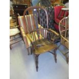 19th Century ash and elm Windsor elbow chair, the tall hoop, stick and pierced splat back above a