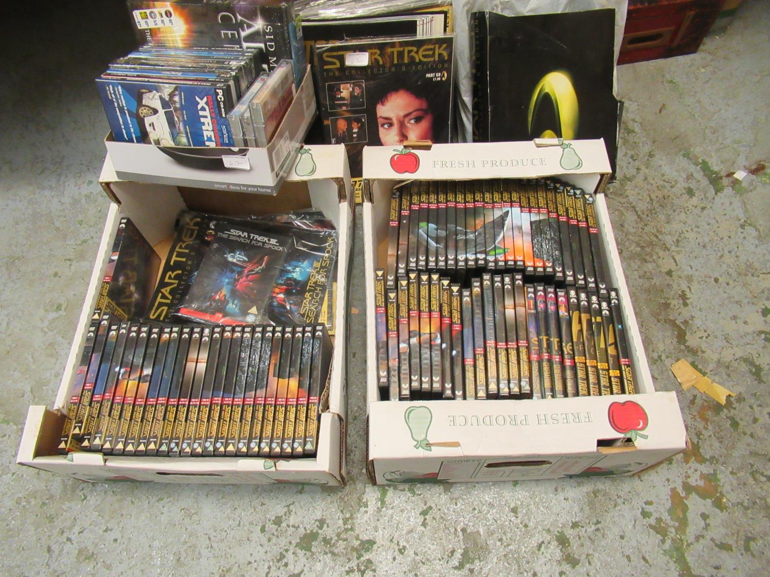 Large quantity of Star Trek DVD's together with a quantity of various PC games