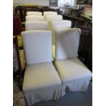 Set of eight modern cream damask upholstered dining chairs on square cut splay supports with