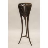 Edwardian mahogany jardiniere stand with basket top