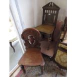 Victorian mahogany hall chair with a shaped pierced back and turned front supports, together with