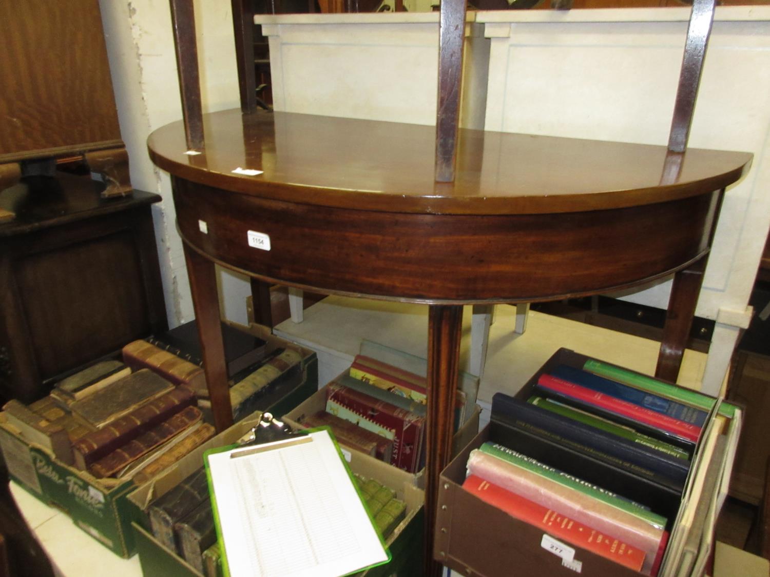 George III mahogany half round side table on square tapering moulded supports