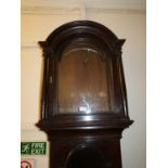 George III mahogany longcase clock case with an arched hood, arched door and plinth base Internal
