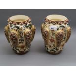 Pair of Zsolnay Pecs oviform vases of typical design decorated with reticulated relief panels on a