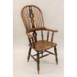 19th Century ash and elm Windsor chair, the hoop, stick and pierced splat back above a carved
