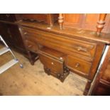 Reproduction oak dressing table with a triple mirror, single linen fold drawer and two smaller