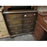 Reproduction mahogany two door television cabinet in the form of a chest of drawers