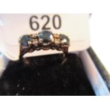 18ct Yellow gold ring set three sapphires and four small diamonds