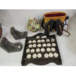 Quantity of miniature silver plated plates on a wooden stand, pair of marble book ends, cased pair