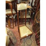 Edwardian beechwood side chair of Arts and Crafts design with a high spindle back, padded seat and