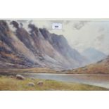 Warren Williams ARCA, watercolour, an extensive Highland loch scene with distant figures in an