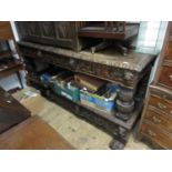 Large Victorian carved oak and parquetry inlaid buffet, the upper section with three relief