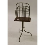 Late 19th / early 20th Century brass and oak magazine stand with swivel top