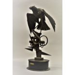 Walenty Pytel (Polish born 1941), stylised welded industrial steel sculpture of a bird of prey, on a