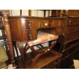 Small early 20th Century mahogany kidney shaped writing table, the nine drawers with brass drop