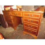 Small reproduction twin pedestal desk together with a bentwood office chair