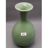 Chinese green Celadon baluster form vase with incised stylised decoration, 13.5ins high Firing crack