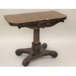 William IV rosewood fold-over card table with tulip carved column support and quadruped base,