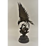 Walenty Pytel (Polish born 1941), welded industrial steel sculpture of an exotic bird on a scroll