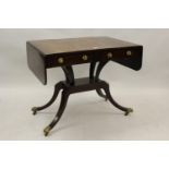 Regency mahogany and black line inlaid drop-leaf sofa table on a quadruped base and ormolu mounts,