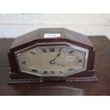 Small Art Deco mahogany wall clock, the silvered dial inscribed ' Finnigans '