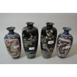 Pair of late 19th Century Japanese cloisonne baluster form vases decorated with flowering trees on a