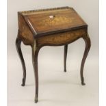 19th Century French rosewood marquetry inlaid bonheur du jour, the brass galleried top above a