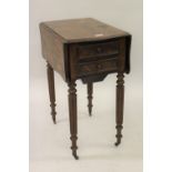 Small 19th Century Continental figured mahogany drop leaf work table, the shaped top above a drawer,