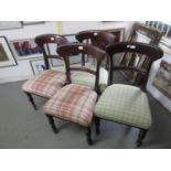 Set of four George IV mahogany dining chairs with rail backs, overstuffed seats and baluster