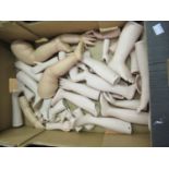 Box containing a quantity of late 20th Century bisque porcelain doll's legs and arms