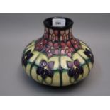 Modern Moorcroft squat baluster form pottery vase with floral tube lined decoration, signed to the